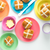 colourful bamboo plates with hot cross buns