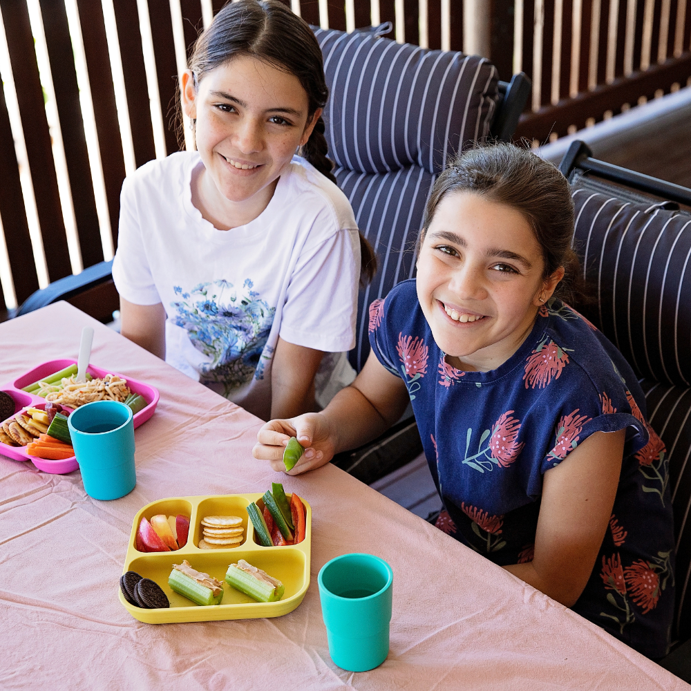 kids bamboo cups being used in a picnic