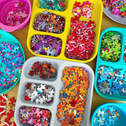 bobo&boo plant-based dishes in multiple colourful dishes holding puzzle pieces